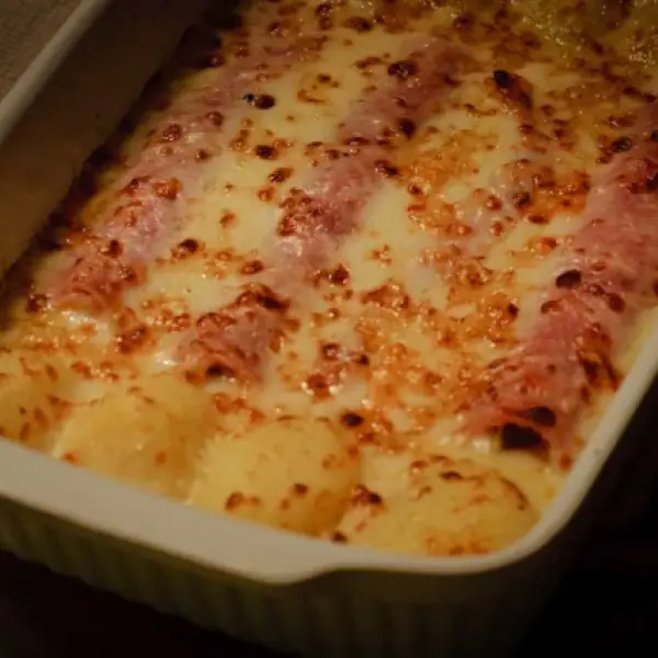 Witlofrolletjes met aardappelpuree en gepaneerde kipfilet